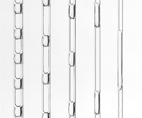 Graphical abstract: Gravity-driven flow of liquid bridges between vertical fibers