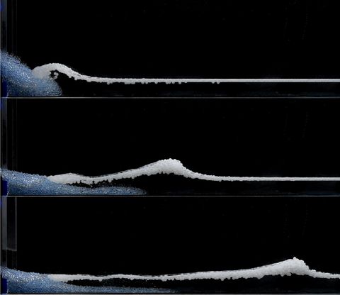 Graphical abstract: Granular collapse on particle-laden water