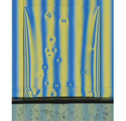 Graphical abstract: Dip coating of viscous granular suspensions