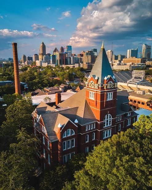 Georgia Tech’s Tech Tower in the foreground, with the Midtown Atlanta skyline behind it